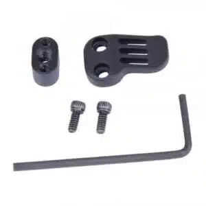 Compact firearm accessory kit with mounting bracket, screws, spacer, and hex key on white background.