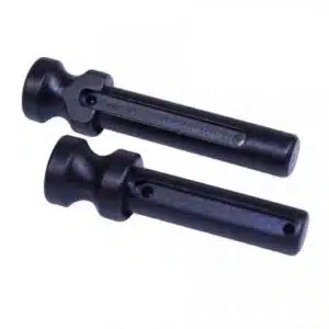 Black toggle pegs with dumbbell shape for fastening in outdoor gear and bags.