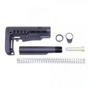 Disassembled AR-15 stock kit: polymer buttstock, buffer tube, and recoil spring with assembly parts.