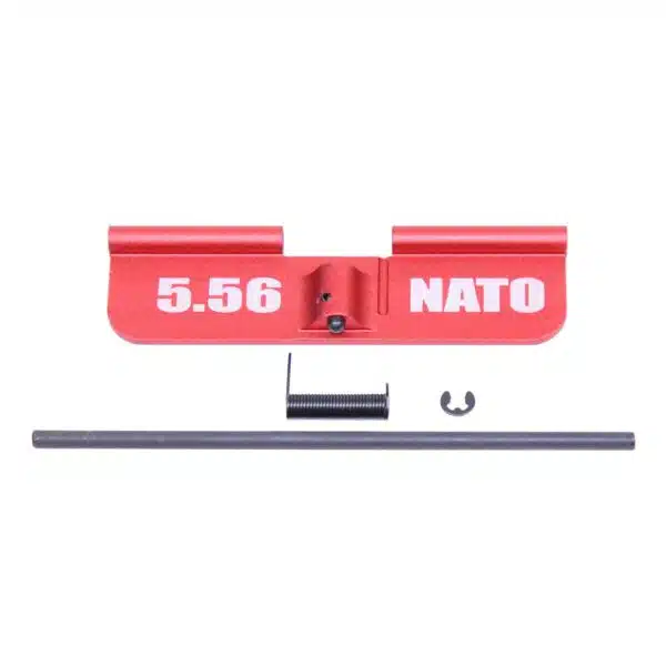 Red AR-15 ejection port cover, engraved 5.56 NATO, with assembly parts included.