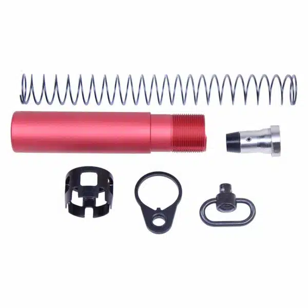 Red anodized AR-15 buffer tube assembly with spring, castle nut, and customization parts.