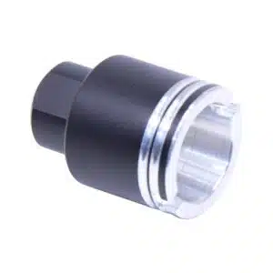 AR-15 stubby slim flash can with black anodized body and machined silver front section