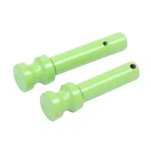 Lime-green AR-15 takedown pins with knobs and holes for firearm assembly.