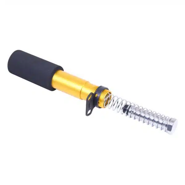 Gold and silver disassembled pneumatic tool component with coil spring and black grip.