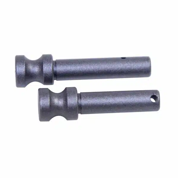 AR 5.56 takedown pin set: gunmetal steel, cylindrical shaft, bulbous end, securing hole.