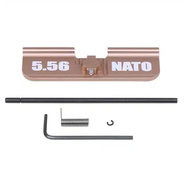 Copper AR-15 dust cover with 5.56 NATO engraving and installation parts, anodized aluminum.