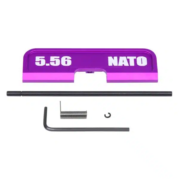Purple anodized AR-15 dust cover with 5.56 NATO marking, includes installation hardware.