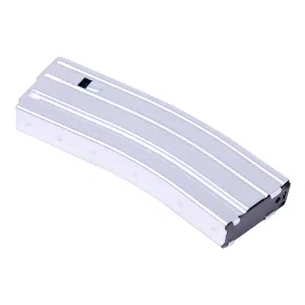 Silver AR-15 magazine with ridged design, black base, and viewing port.