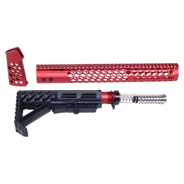 Red and black AR-15 accessories: honeycomb handguard, angled grip, adjustable stock.
