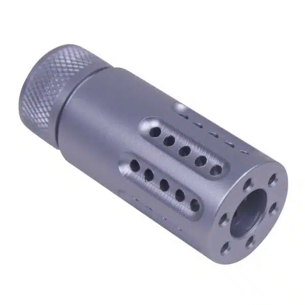 High-performance muzzle brake with multi-port design for recoil reduction and easy firearm attachment.