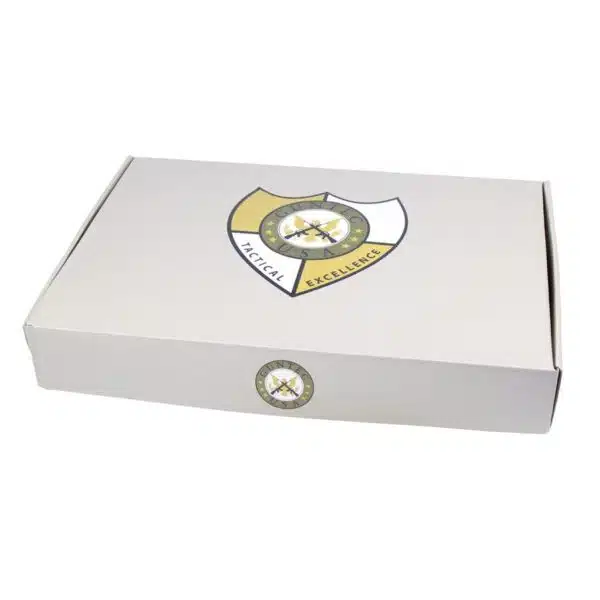Minimalist white packaging box with circular gold emblem for premium retail products.