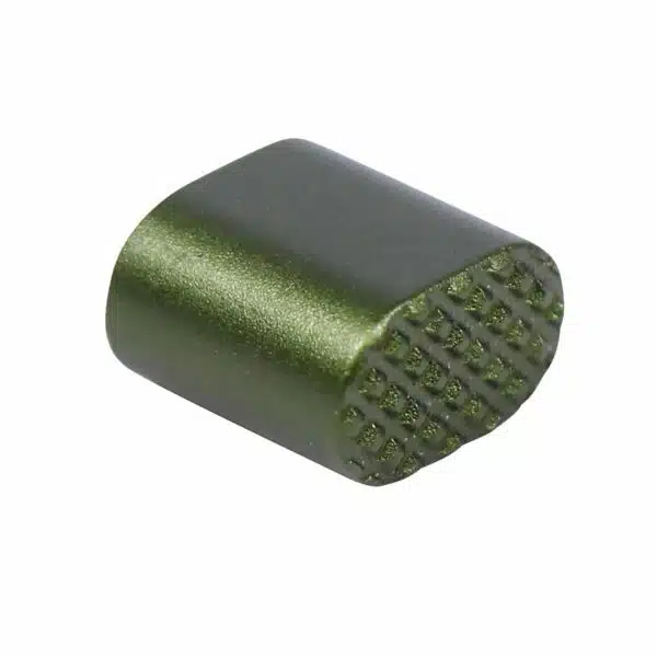 Olive green AR-15 magazine release button with textured grip and smooth, metallic finish.
