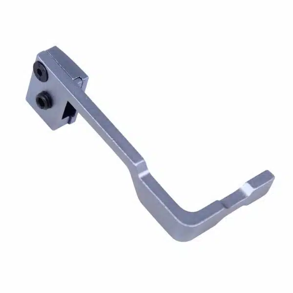 Metallic trigger component with ergonomic design for firearms, anodized bluish-gray finish.