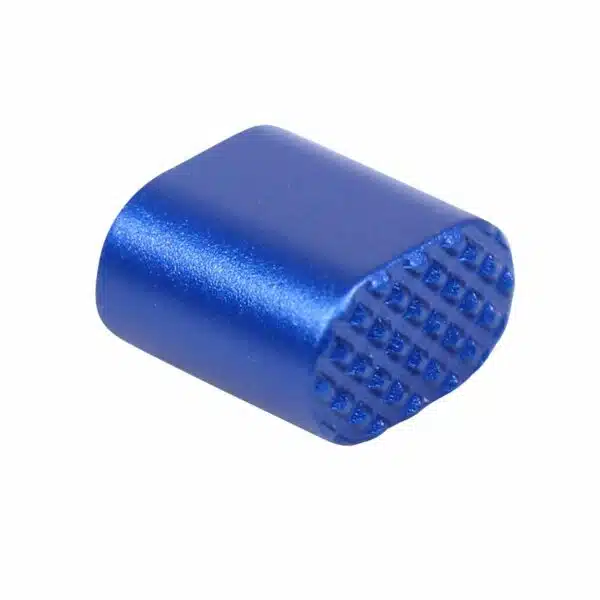 Vibrant blue cylindrical mechanical component with textured end, likely for AR-15 magazine release.