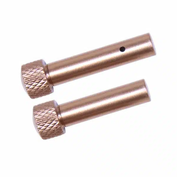 Copper cylindrical components, knurled for grip, precision-engineered for industrial applications.
