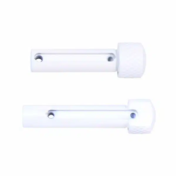 White plastic cabinet latches with screw holes for secure and easy installation.