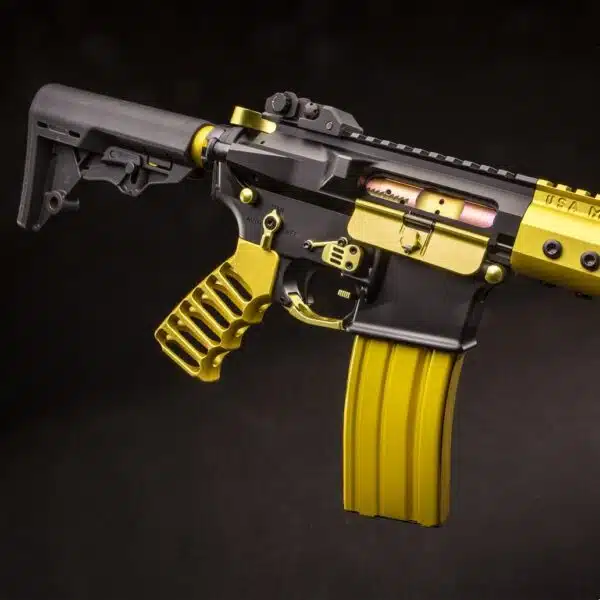 Custom Black and Yellow AR-15 Rifle with Collapsible Stock and Tactical Rail System.