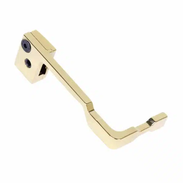Luxurious brass door handle with modern geometric design and polished gold-brass finish.
