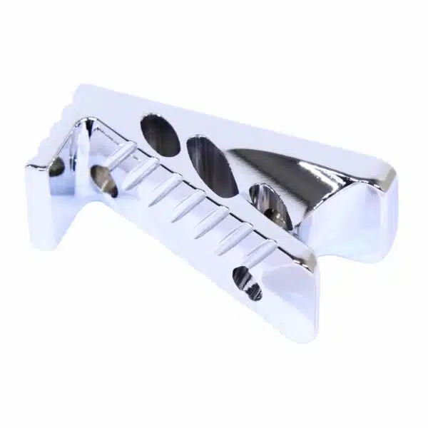 Polished chrome automotive bracket with geometric design, fins for cooling, and circular mounting holes.