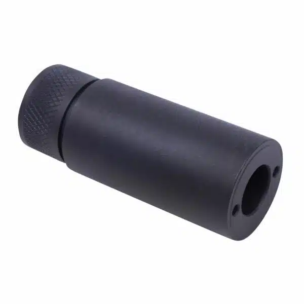Compact matte black muzzle device with knurled grip for firearm recoil and flash reduction.