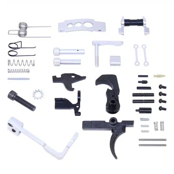 Organized AR-15 lower parts kit showcasing assembly components on a white background.
