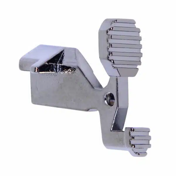 Chrome sewing machine presser foot with ribbed rollers for precision fabric control.