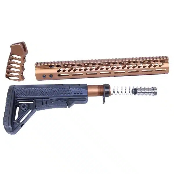 Disassembled bronze AR-10 customization parts: handguard, tactical stock, and buffer tube assembly.