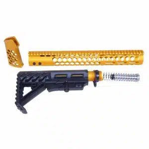 Custom AR-15 parts set: gold honeycomb handguard, black tactical stock, silver buffer tube.