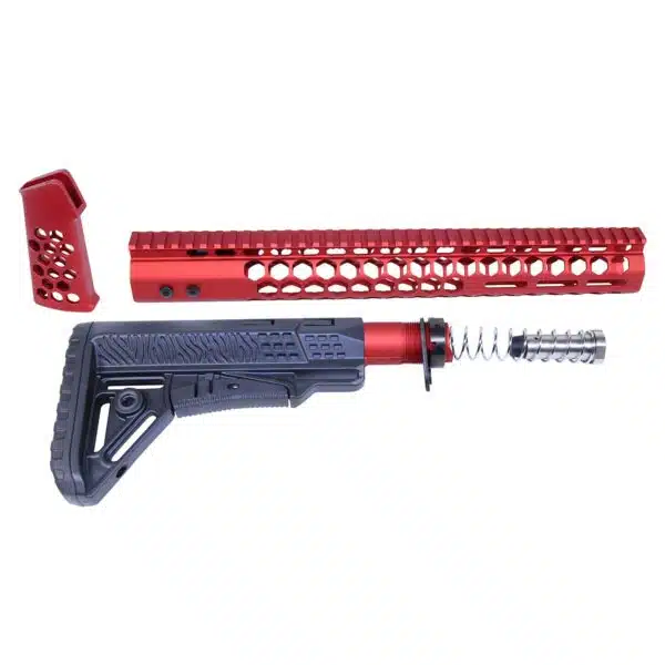 Modular AR .308 rifle components in anodized red, including stock, handguard, and foregrip.