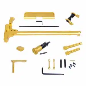 AR .308 Cal Accent Kit in Anodized Gold finish, showing charging handle, safety, mag catch, and pins laid out on white background.