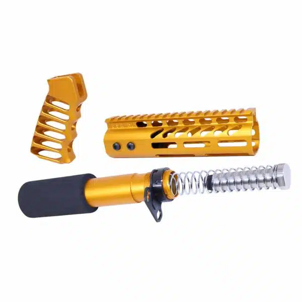 Gold anodized AR-15 parts: skeletal grip, ventilated handguard, buffer tube with spring.
