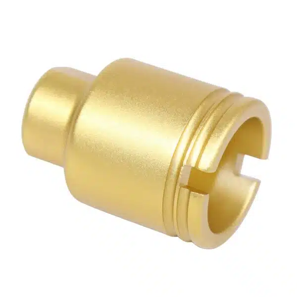 Brass CNC-machined cylinder with grooves, C-shaped cut-out; used in mechanical, electrical fittings.