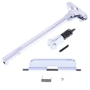 Chrome 5.56 AR-15 charging handle, forward assist assembly, and hardware components on white background