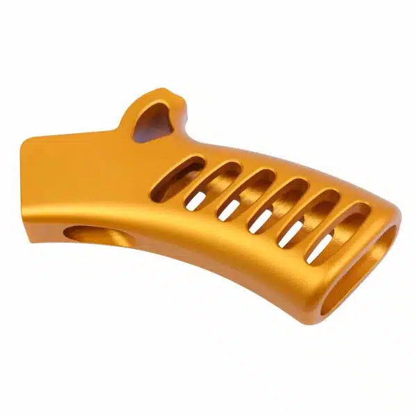 Golden aluminum ergonomic firearm grip with precision slots and matte anodized finish.