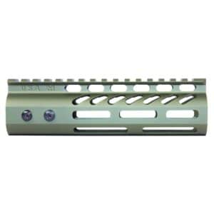Anodized green tactical rail handguard with ventilation slots and Picatinny rail for firearms.