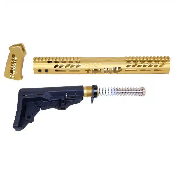 Gold and black custom AR-15 parts with anodized handguard, grip, and adjustable stock.