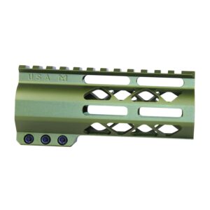 Olive green tactical rifle handguard with Picatinny rail, diamond cutouts, and blue attachment screws.