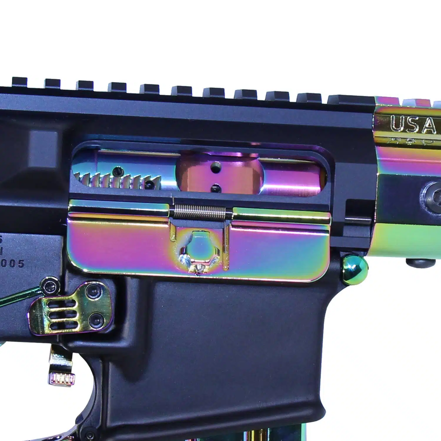 AR-15 bolt carrier group with gloss rainbow PVD finish installed in upper receiver.