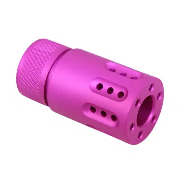 Pink metallic muzzle brake with knurled grip and ports, enhancing firearm style and function.