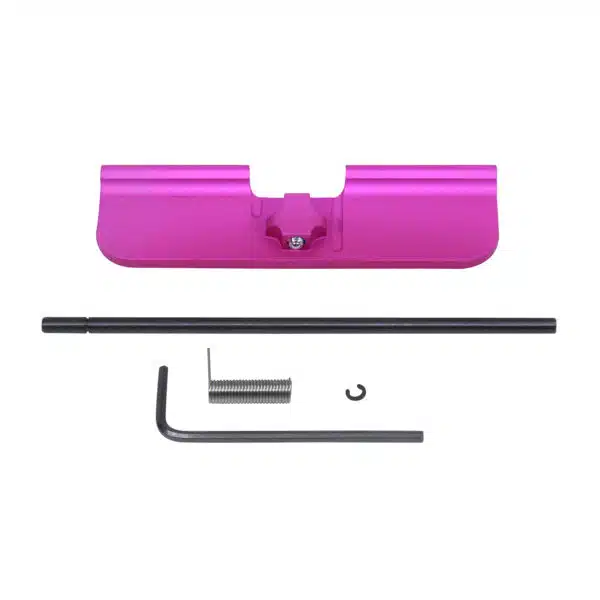 Hot pink AR-15 dust cover with installation tools; bold customization accessory.