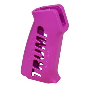 Bright pink AR-15 pistol grip with TRUMP branding, ergonomic design, and glossy finish.