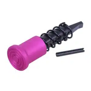 AR-15 forward assist assembly with anodized pink button, black spring, and pin