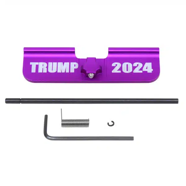 AR-15 Gen 3 dust cover with TRUMP 2024 inscription in anodized purple.