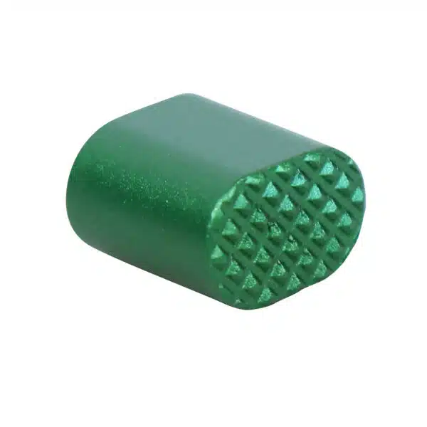 Green AR-15 extended mag release button with textured grip surface.