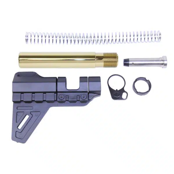 Gold-plated AR-15 pistol brace kit with components, including buffer tube and stabilizing brace.