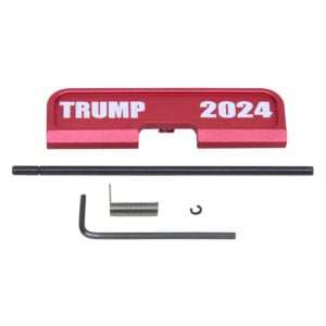 AR-15 dust cover and components with TRUMP 2024 text in anodized red.