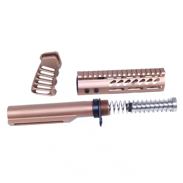 Copper finish AR-15 components including buffer tube, spring, and vented handguard.