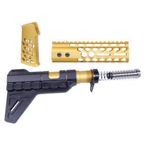 AR-15 pistol furniture set in anodized gold with honeycomb design and brace.