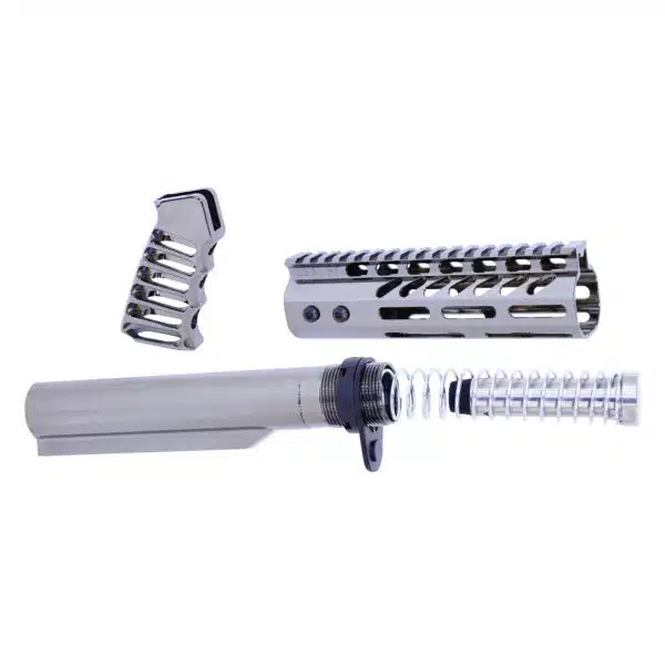 AR-15 rifle components: buffer tube, handguard, pistol grip for assembly and customization.