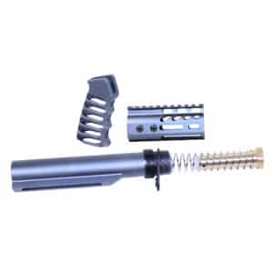 AR-15 rifle components: grip, rail system, buffer tube, spring, laid on a white background.